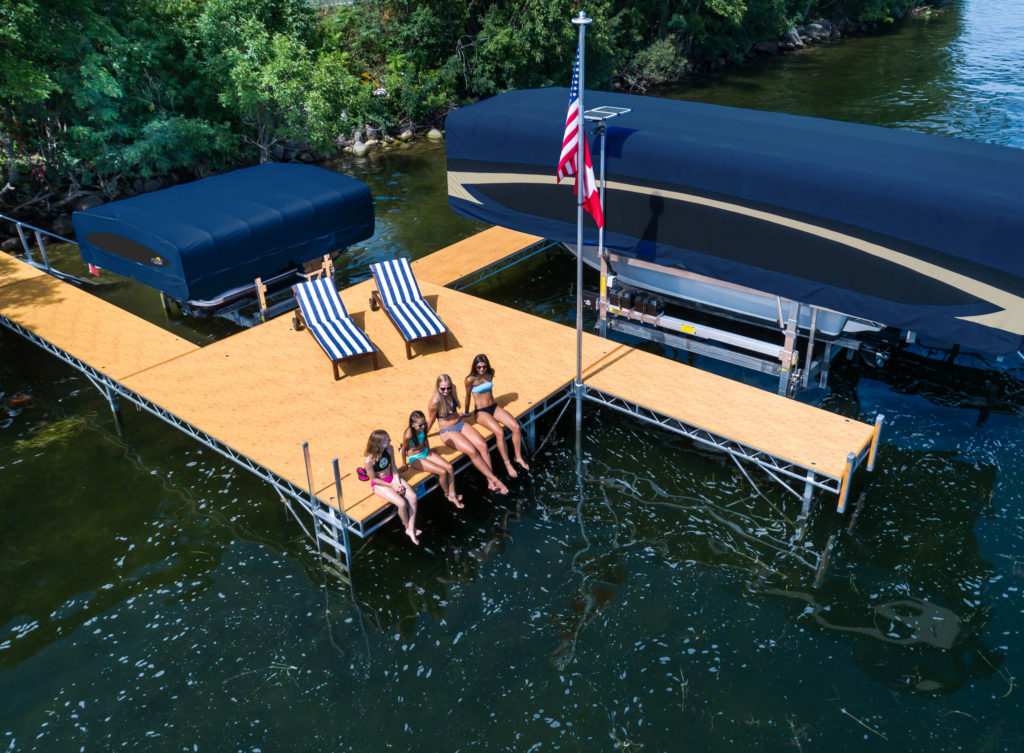 FLOE Roll-In dock with girls enjoying lake