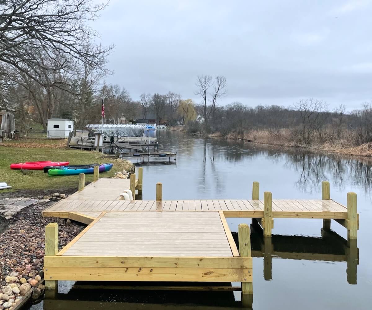 Dock built for Nagawicka Lake that features a Kayak platform for easy lake access.